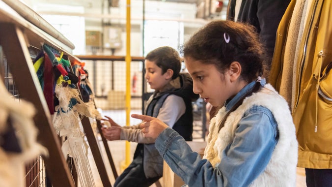 Doing a weaving activity at Quarry Bank Mill, Cheshire